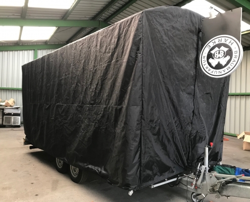 Protective cover for a trailer, trailer, beer truck